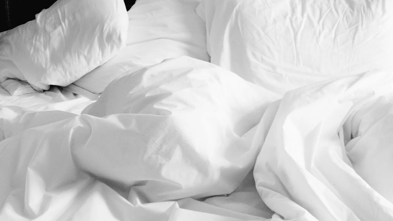 Detalhe do detergente líquido usado em roupas de cama.